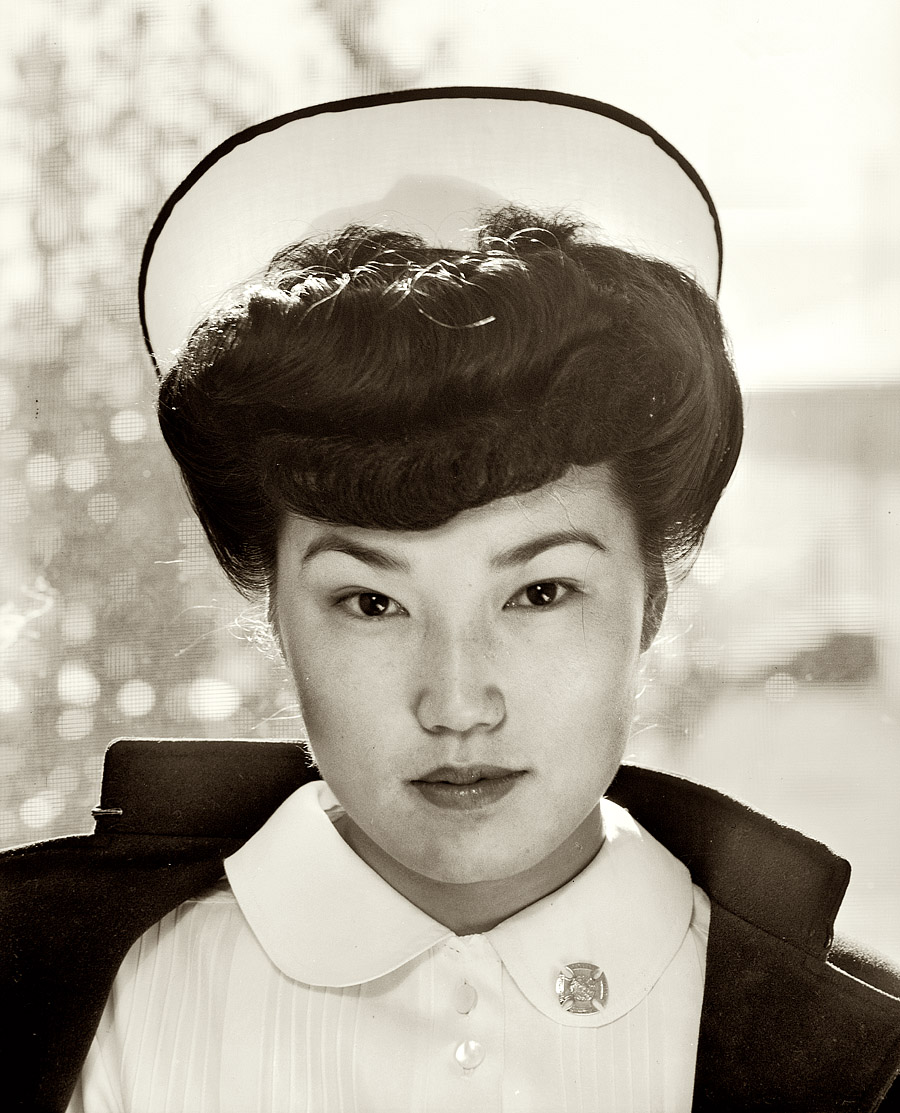 Nurse Aiko Hamaguchi at the Manzanar Relocation Center, California, in 1943. Medium format safety negative by Ansel Adams. View full size.