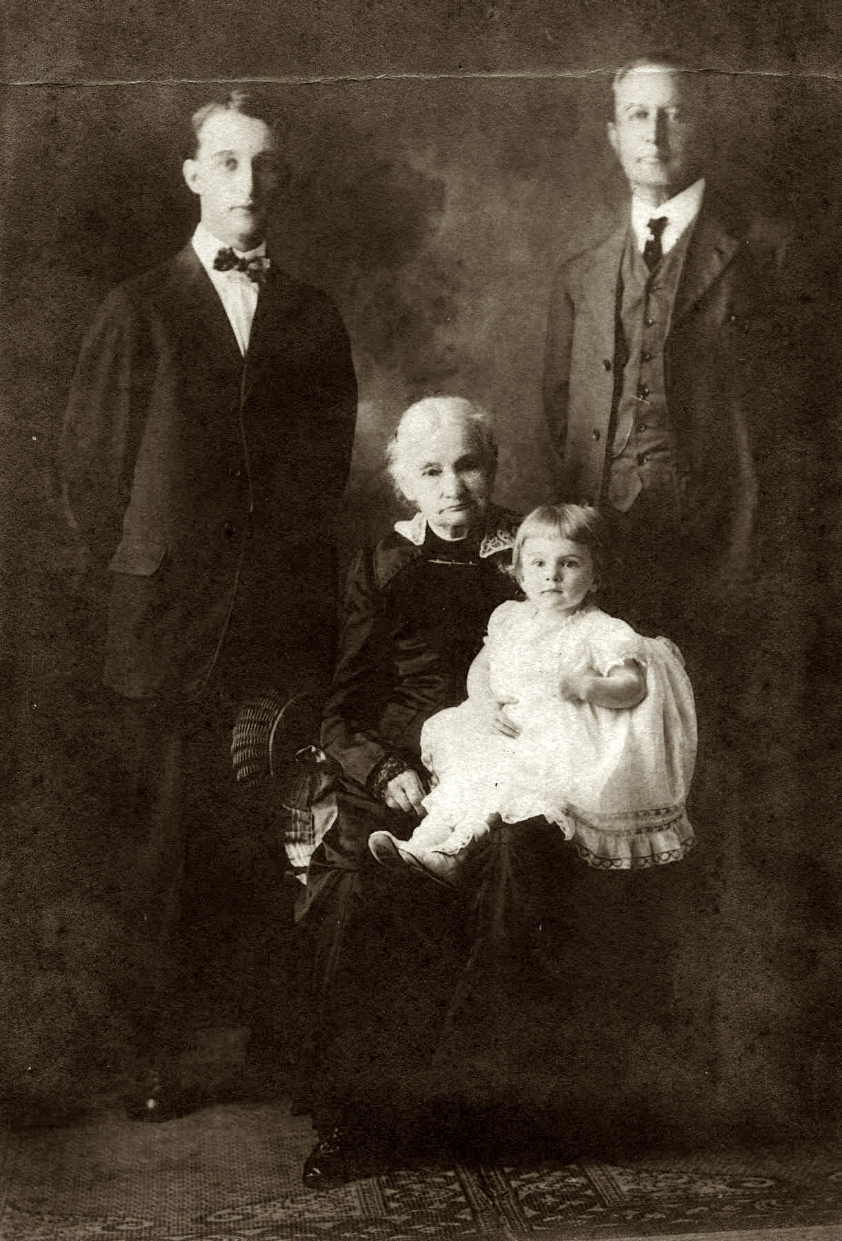 Mr. Stebbins Sr., Grandmother Stebbins (seated), Frank Charles Stebbins I & Ida Norma Stebbins (infant) about 1915.