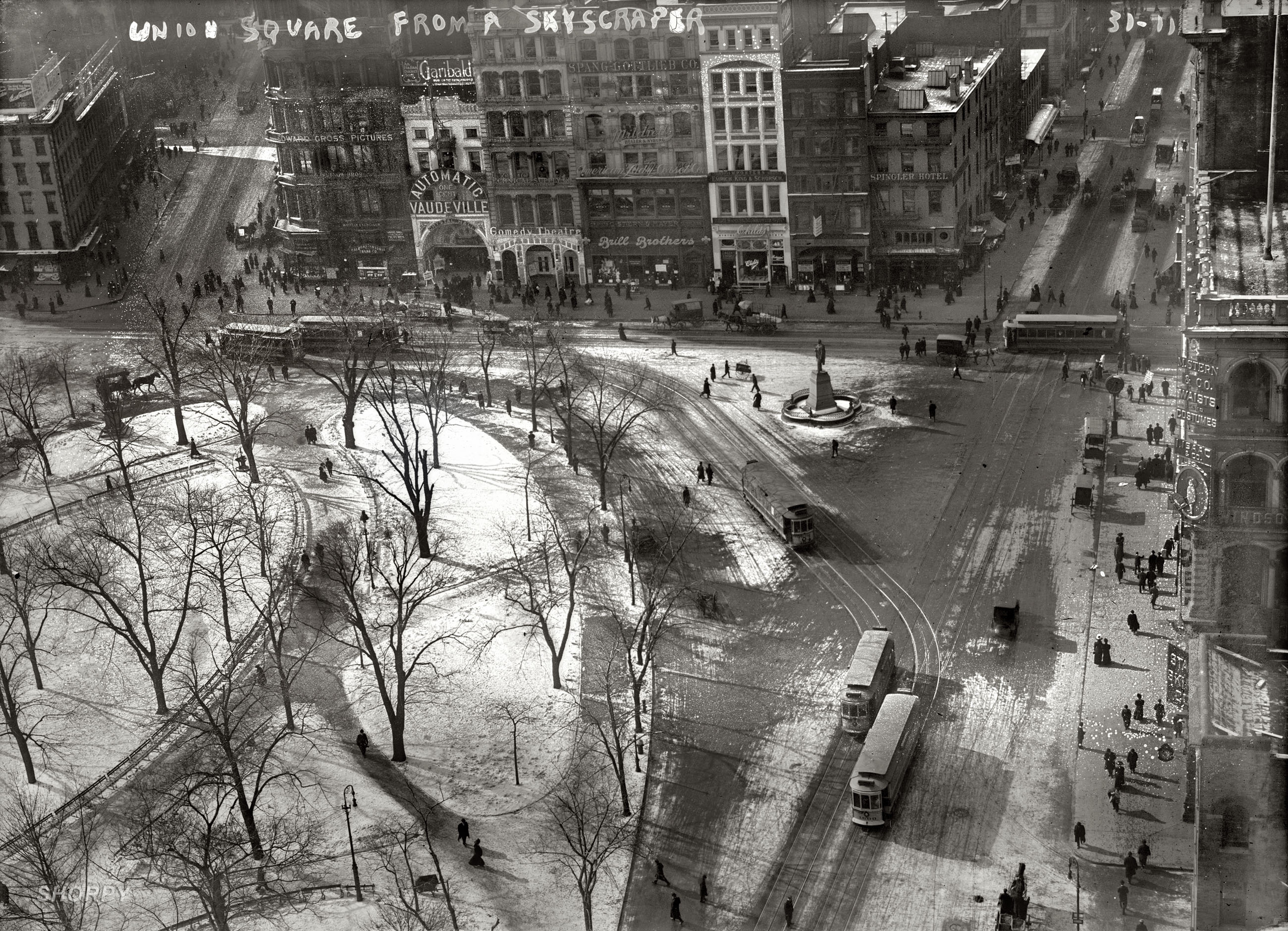 "Union Square from a skyscraper." Winter in New York 100 years ago. A little moldy but full of interesting details like the "Automatic Vaudeville" penny arcade and Brill Bros. store. 5x7 glass negative, George Grantham Bain. View full size.