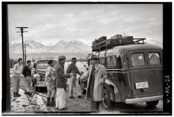 Departure and farewells at the Manzanar Relocation Center, 1943. View full size. Photograph by Ansel Adams.