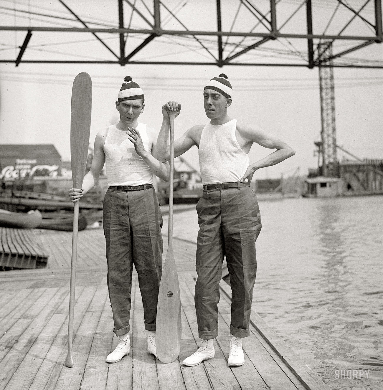 Washington circa 1919. "Bob Marmion." Robert "Bob" Marmion, on the right, and an unidentified partner. With canoe paddles from Walford's Sporting Goods. National Photo Company Collection glass negative. View full size.