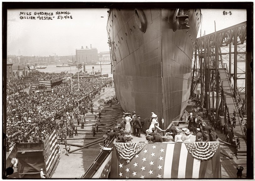 Miss Goodrich breaking bottle and christening the fleet collier Vestal at Brooklyn Navy Yard. May 19, 1908. View full size. George Grantham Bain Collection.