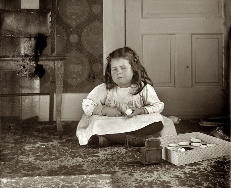 January 1901. Dayton, Ohio. "Bertha Wright, age five, niece of the Wright brothers, daughter of Lorin Wright," with some of her many Christmas presents. Dry-plate glass negative by the Wright Brothers. View full size.
