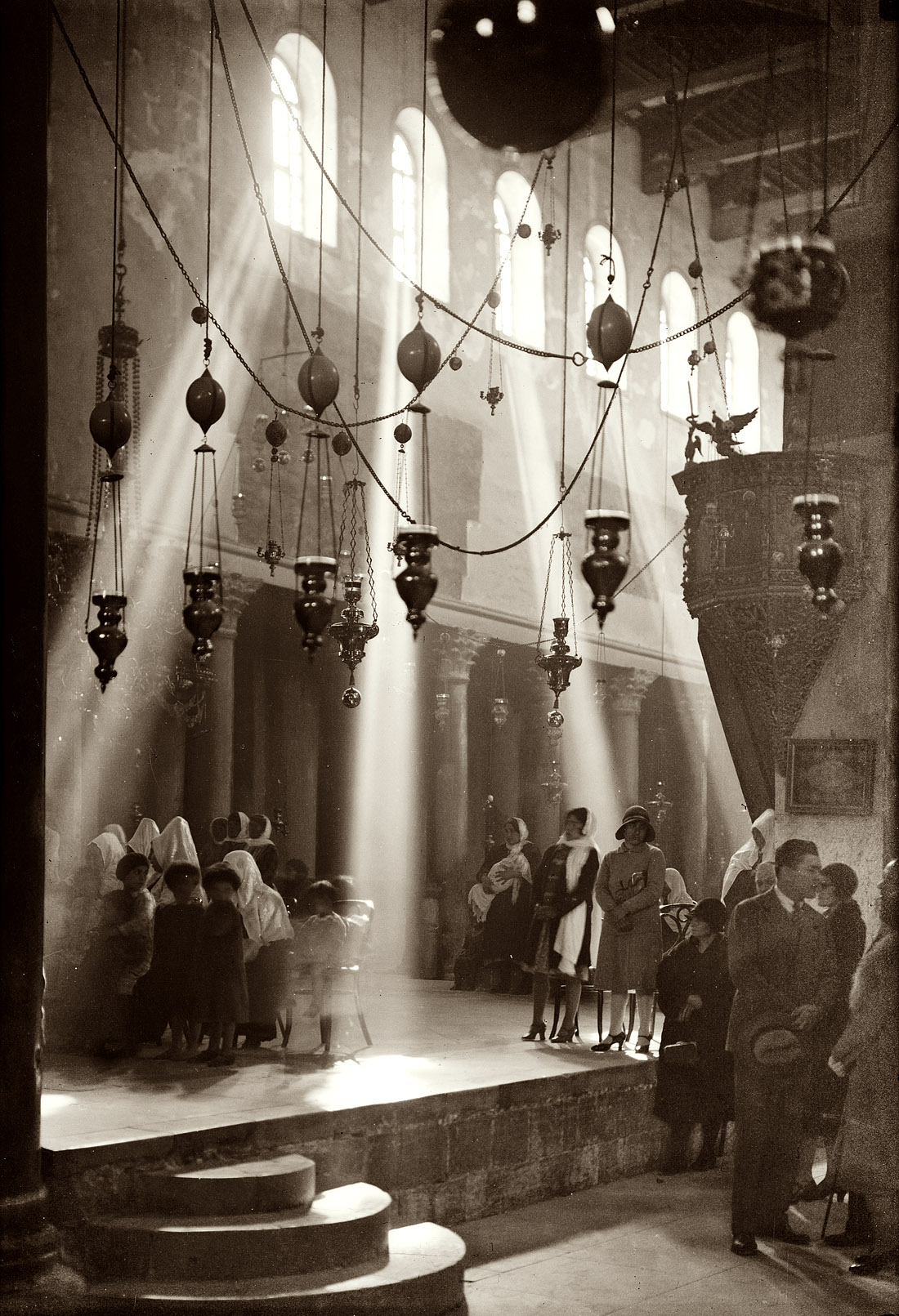 Christmas in the Church of the Nativity at Bethlehem circa 1940. View full size. 4x5 glass-plate negative, G. Eric and Edith Matson Photograph Collection.