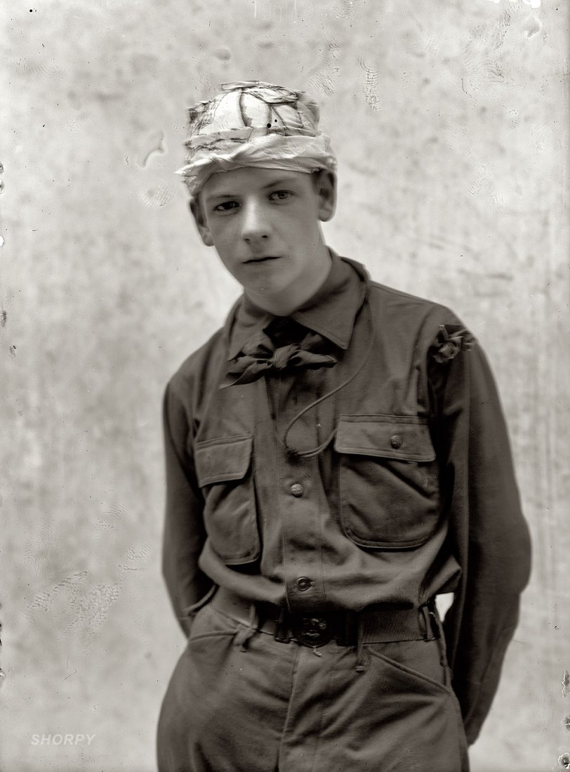 "Boy Scout training demonstration, 1912." Part of a series showing bandaged Boy Scouts in Washington. Harris &amp; Ewing Collection glass negative. View full size.
