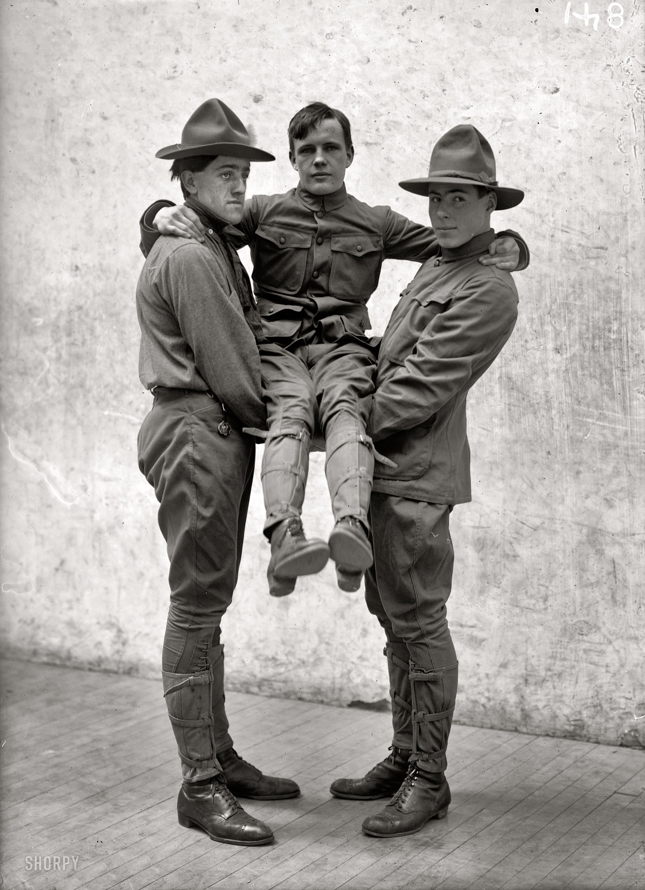 "Boy Scout Training demonstration, 1912." Yes, they're back. I found a few more of these oddly poignant portraits of Scouting first aid to the injured. Harris & Ewing Collection glass negative. View full size.