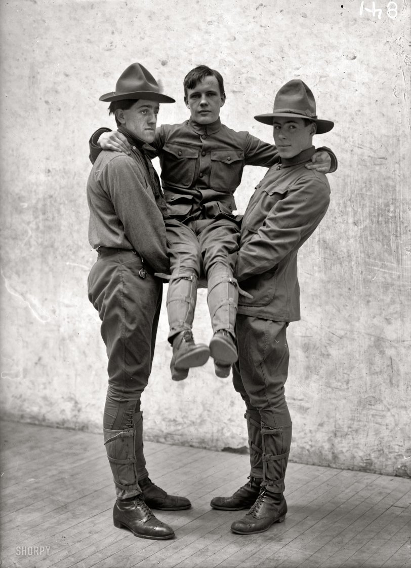 "Boy Scout Training demonstration, 1912." Yes, they're back. I found a few more of these oddly poignant portraits of Scouting first aid to the injured. Harris &amp; Ewing Collection glass negative. View full size.
