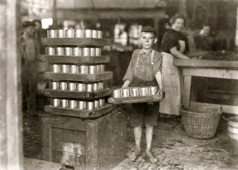 July 1909. Baltimore, Md. "One of the small boys in J.S. Farrand Packing Co. and a heavy load. J.W. Magruder, witness." Photo: Lewis Wickes Hine. View full size.
