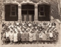This photo was found in a large box of photographs that I purchased from a dealer in Cincinnati. On the back it is marked "8th Grade Class Avondale School." Avondale is a neighborhood just north of downtown Cincinnati. The neighborhood was largely Jewish until the late 60's/early 70's when the Jewish population migrated to suburbs even further north.  Judging from the bobbed hair and clothes I'm identifying it as being from the 1920's. View full size.
AvondaleJust in case anyone wants to know I'm African American. I lived in the Avondale neighborhood while growing up in Cincinnati in from 1956 to 1971.The Jewish flight from Avondale began after WWII. The southern part of Avondale, where we lived,  was a predominantly black area with a few senior Jewish folks still residing. In fact there were still Jewish synagogues  in the area. Now the northern part of Avondale was still mostly Jewish at the time I described. A Google search will set anyone straight on this matter.
(ShorpyBlog, Member Gallery)