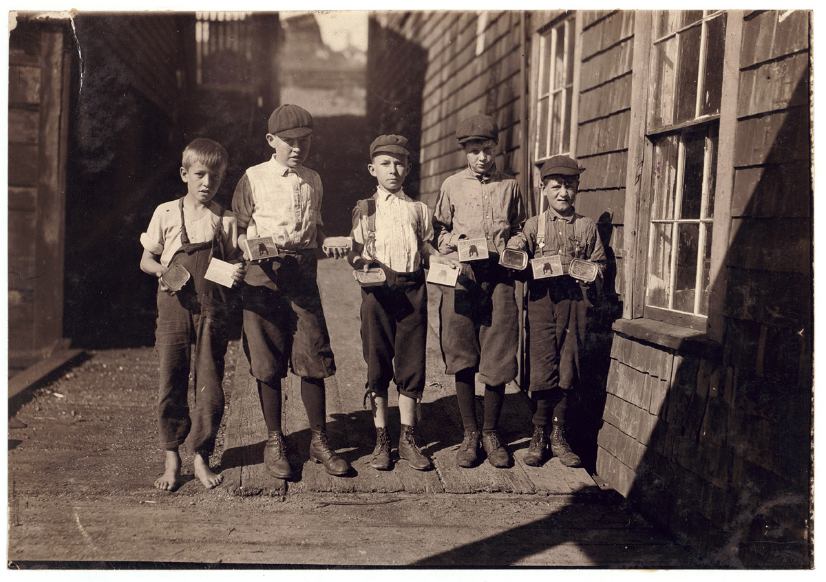 Some of the cartoners, not the youngest, at Seacoast Canning Co., Factory #2, Eastport, Maine. August 1911. Photograph by Lewis Wickes Hine.  View full size.