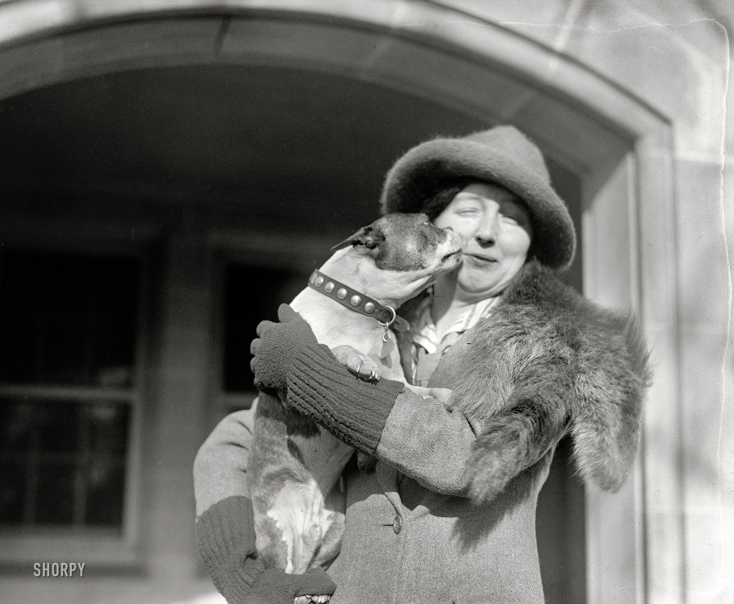 January 14, 1920. Washington, D.C "Margaret Bell Saunders." Be a good boy and Mama won't have you turned into a coat! National Photo Co. glass negative. View full size.