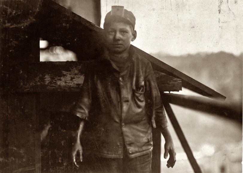 December 1910. "Shorpy Higginbotham, a 'greaser' on the tipple at Bessie Mine, of the Sloss-Sheffield Steel and Iron Co. in Alabama. Said he was 14 years old, but it is doubtful. Carries two heavy pails of grease, and is often in danger of being run over by the coal cars." Photograph and caption by Lewis Wickes Hine. View full size.
