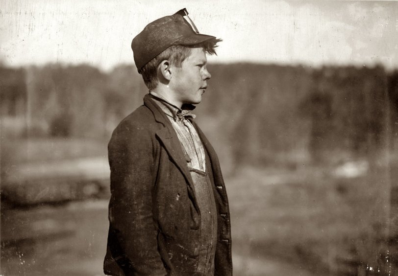 Dave, a young "pusher" at Bessie Mine. Jefferson County, Alabama. December 1910. View full size. Photograph and caption by Lewis Wickes Hine.
