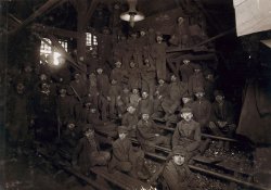 Noon hour in the Ewen Breaker, Pennsylvania Coal Co., South Pittston. January 1911. Spooky full image. Photograph by Lewis Wickes Hine.

"Breaker boys," or slate pickers, sat astride the breaker chutes, through which the coal roared, and picked out slate and other debris by hand. Boys as young as 8, working ten-hour days, began their coal careers in the breakers. They were paid less than the adults who performed the same work and faced the hazard of hand injuries or even falling into the chutes. Some breaker boys were the sons of miners who had been killed or disabled, often the only remaining source of income for their families. In 1900, boys accounted for one-sixth of the anthracite coal work force. Read a firsthand account of the breaker boys' work.