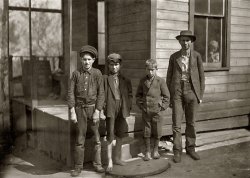 October 1908. Fairmont, West Virginia. "These boys (and one other small one) and their father work in Monongah Glass Works. Father gets $1.75 a day, one boy $1.25 a day, four get 80 cents. Total $6.20 a day. Live in a tumble-down house. What is the trouble?" Photo and caption by Lewis Wickes Hine. View full size.