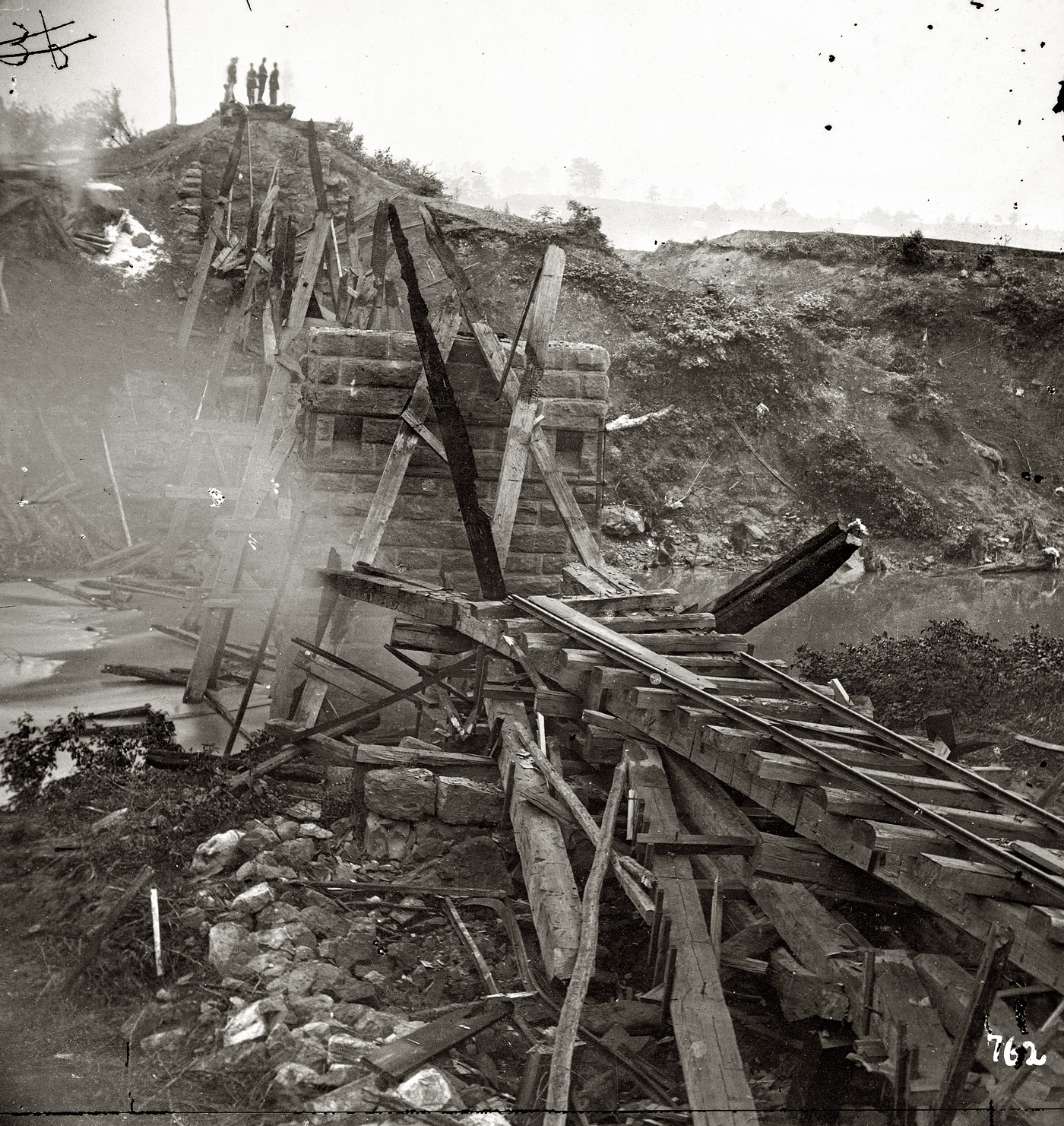 May 25, 1864. "North Anna River, Virginia. Destroyed bridge of the Richmond & Fredericksburg Railroad." Wet plate glass negative, left half of stereo pair, by Timothy H. O'Sullivan. Library of Congress. View full size.