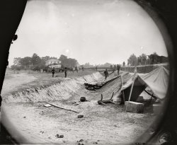 "Photographs from the siege of Petersburg, Va. Redoubt near Dunn's house in outer line of Confederate fortifications captured June 14, 1864, by Gen. William F. Smith." Wet plate glass negative by Timothy O'Sullivan. View full size.
