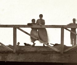 Spring 1865. A closeup of the young ladies shown in an earlier post of the Canal Bridge at Seventh Street in Richmond, Virginia. View full size.
