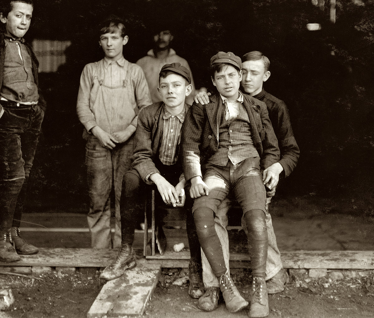 November 1909. "Woodbury Bottle Works. Woodbury, New Jersey. Noon hour. All are workers." View full size. Photograph by Lewis Wickes Hine.