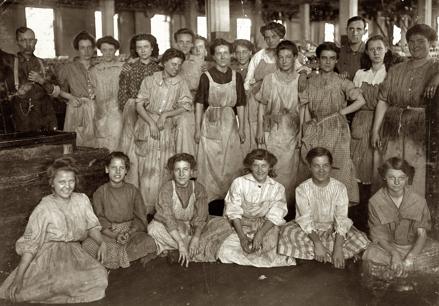 August 1908. "Noon hour in an Indianapolis cotton mill. Witness, E.N. Clopper." View full size. Photograph and caption by Lewis Wickes Hine.