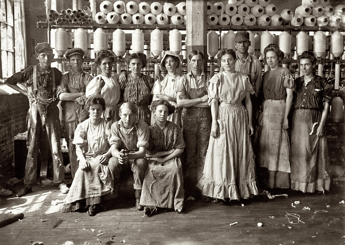 The workplace of 100 years ago. "Operatives in Indianapolis Cotton Mill. Noon Hour. August 1908." View full size. Photograph by Lewis Wickes Hine.