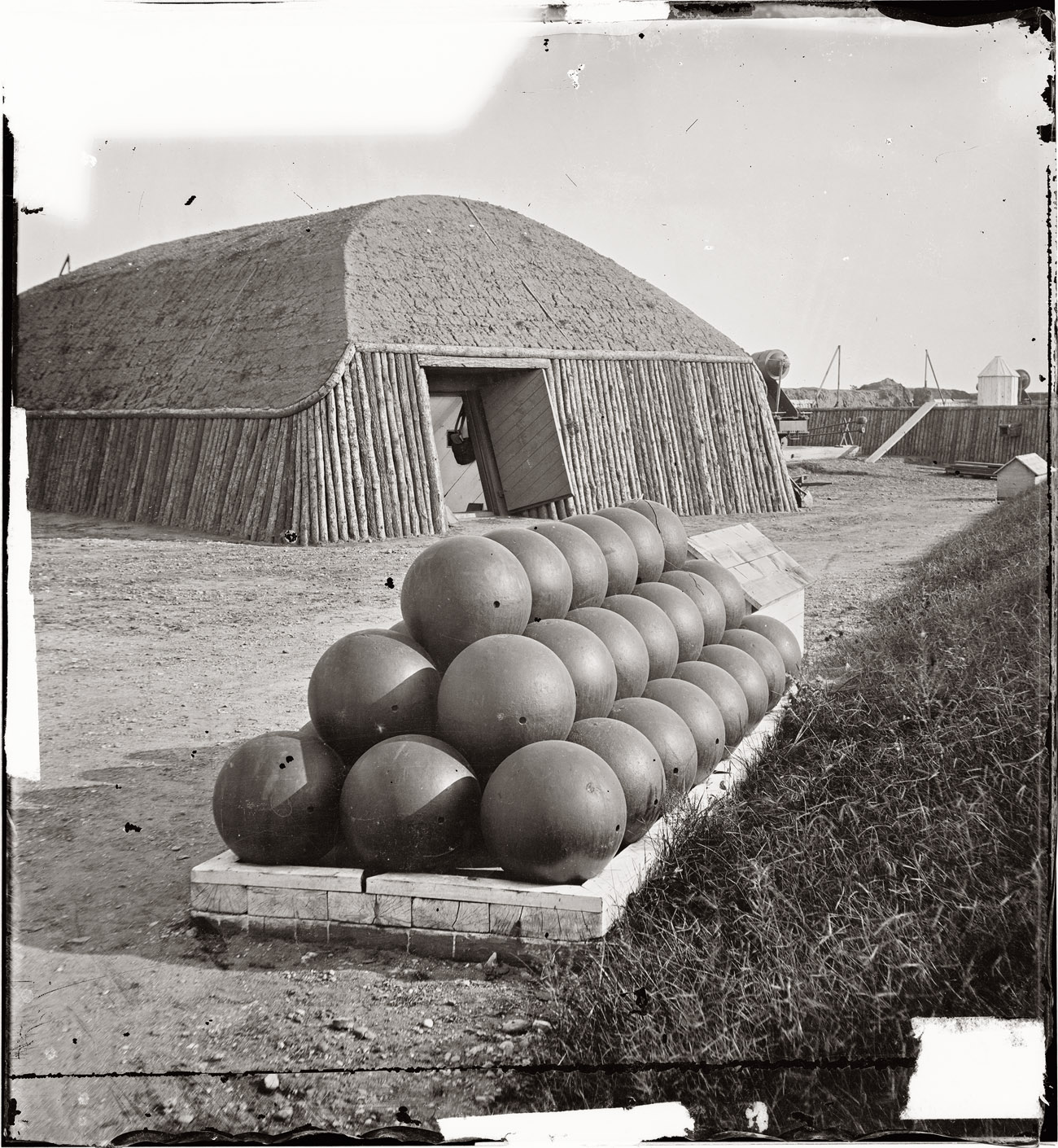 Magazine and cannonballs at Battery Rodgers, Alexandria, defending Washington during the Civil War, circa 1863. View full size. Half of stereograph pair.
