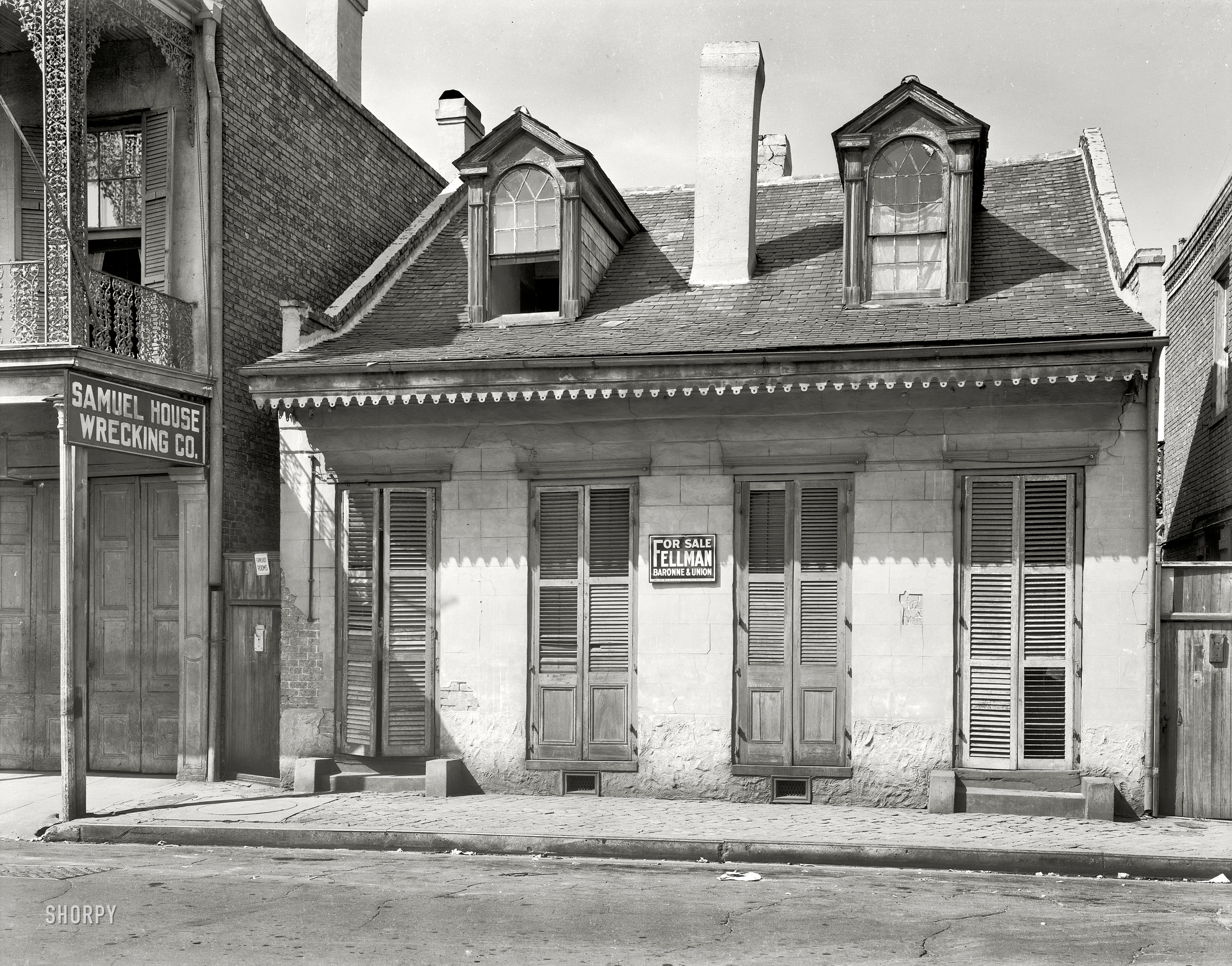 New Orleans circa 1937. "813-815 Toulouse Street." Watch out for the neighbors. 8x10 inch acetate negative by Frances Benjamin Johnston. View full size.