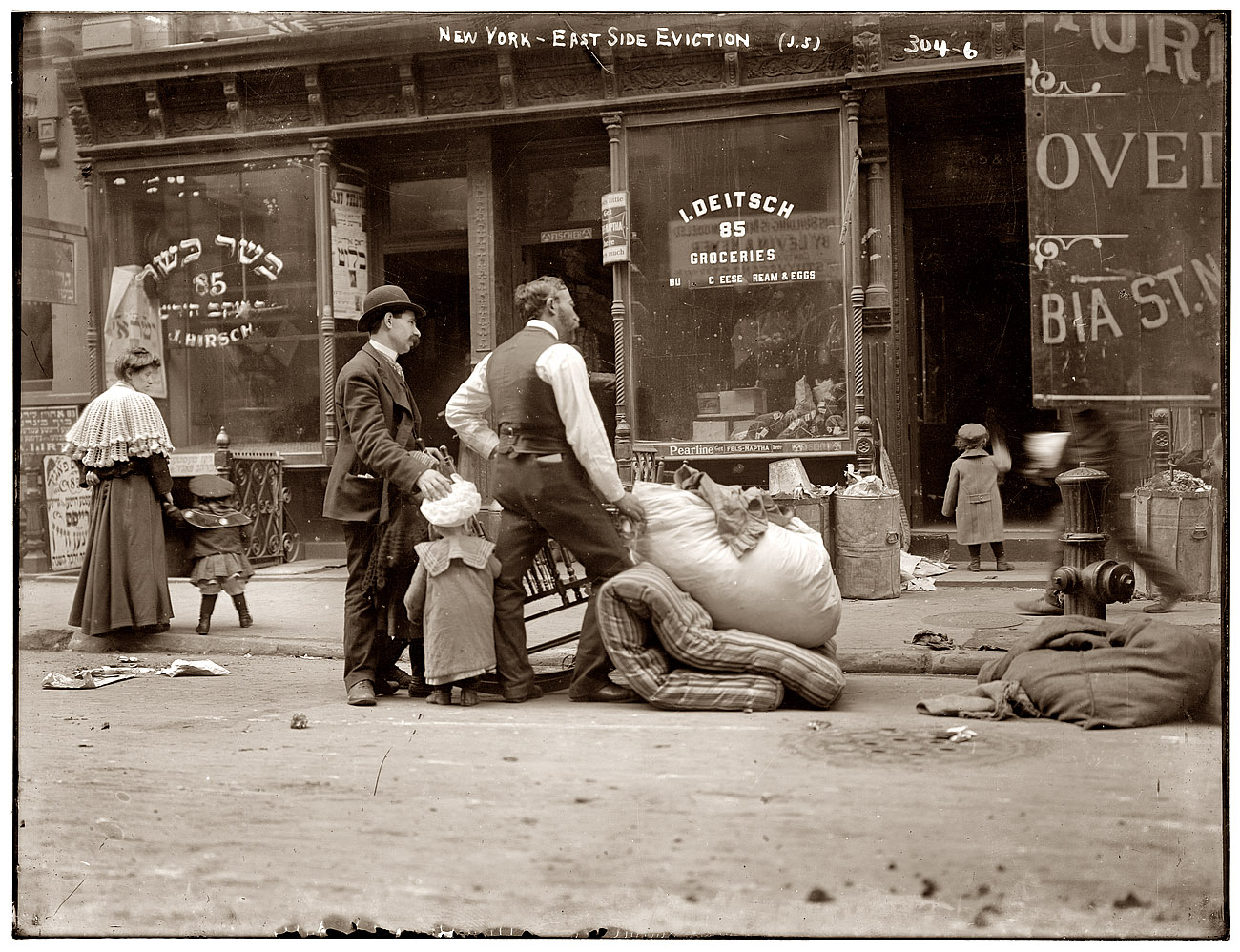 Eviction in an East Side neighborhood of New York circa 1908. View full size. 8x10 glass negative, George Grantham Bain Collection.