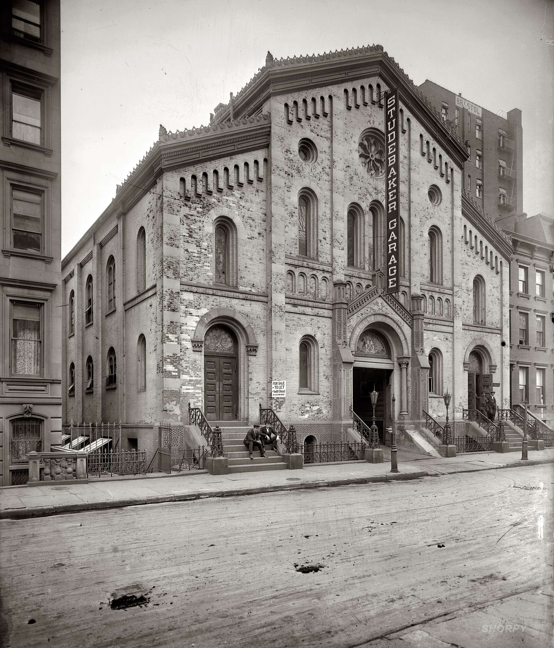 New York, 1908. "Old church on 48th Street." Studebaker Garage, a former Christian Science house of worship, at 143 West 48th Street. View full size. 8x10 glass negative, George Grantham Bain Collection, Library of Congress.