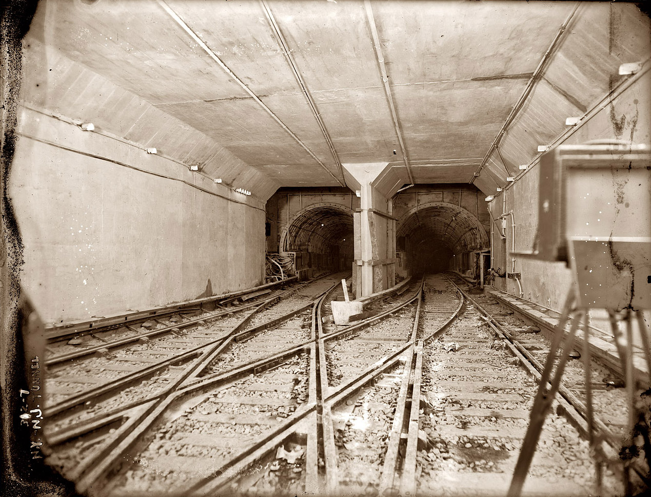 "New York - New Jersey Tunnel." One of two pairs of Hudson & Manhattan Railroad tunnels under the Hudson River sometime around their opening in 1908, after more than 30 years of off-and-on construction. A century later, the system operates the PATH trains between New Jersey and New York. View full size. 8x10 glass negative, George Grantham Bain Collection. (History of the tubes.)