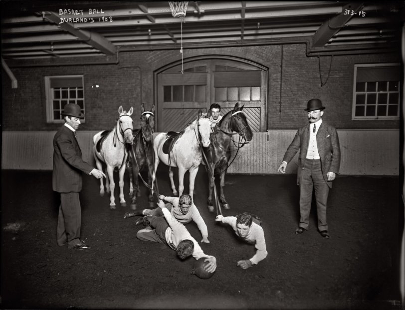 Basketball on the tanbark at Durland's Riding Academy, New York. 1908. Evidently it's traveling if you let go of the reins. View full size. George Grantham Bain Collection. Check out how this pic looked before restoration.