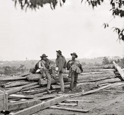 July 1863. "Gettysburg, Pa. Three captured Confederate soldiers, likely from Louisiana, pose for Mathew Brady on Seminary Ridge following the Battle of Gettysburg." Wet plate glass negative, half of stereograph pair. View full size.