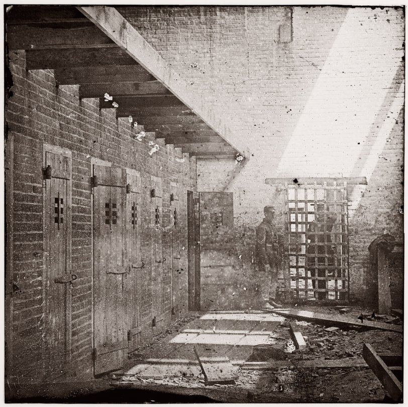 Price, Birch slave pen cells at Alexandria, Virginia, circa 1865. Wet collodion, half of glass plate stereograph pair. View full size.