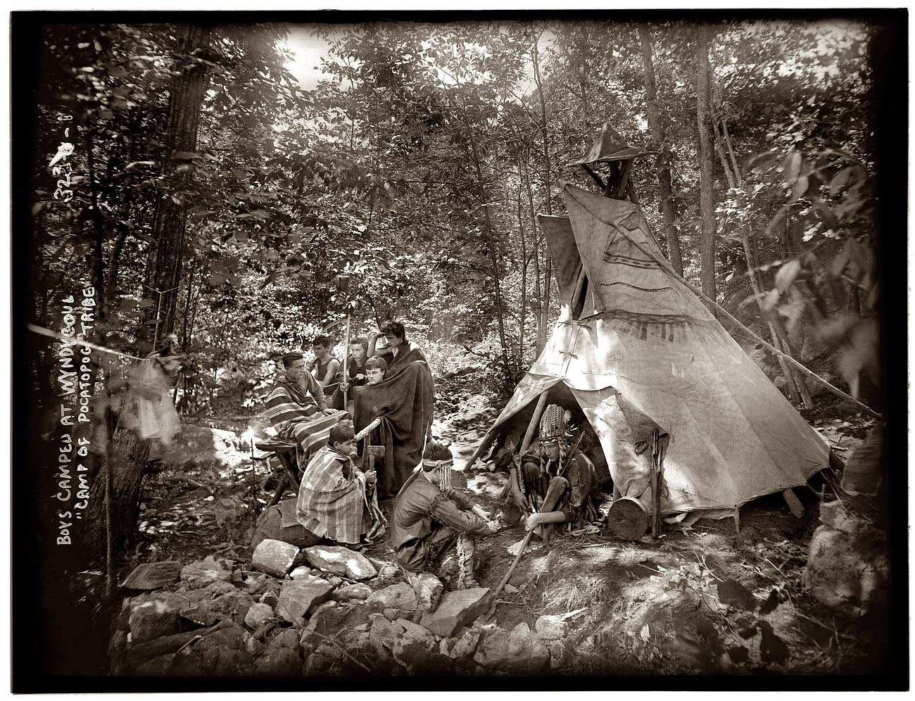 "Boys camped at Wyndygoul, the camp of the Pocatopog tribe" circa 1908. View full size. 8x10 glass plate negative, George Grantham Bain Collection.
