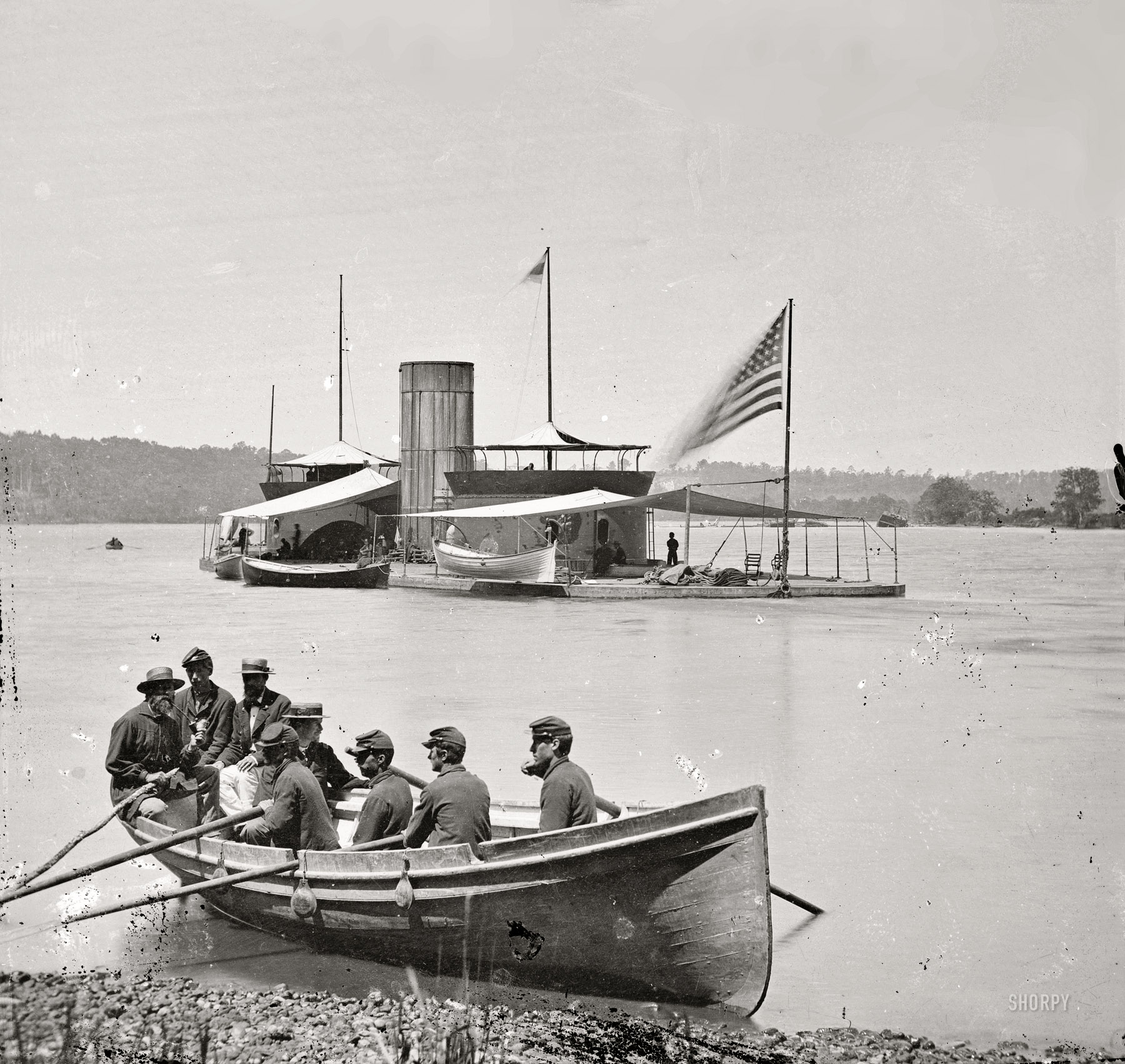 1864. "James River, Virginia. Monitor U.S.S. Onondaga; soldiers in rowboat. From photographs of the Federal Navy, and seaborne expeditions against the Atlantic Coast of the Confederacy." Wet plate glass negative. View full size.
