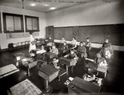 "Mentally Retarded children in E.S.F.S. for Crippled Children." New York circa 1908. "Feeble-minded in cripple school" is the non-PC caption written on this classroom scene showing the East Side Free School for Crippled Children, 155-157 Henry Street. George Grantham Bain Collection glass negative. View full size.