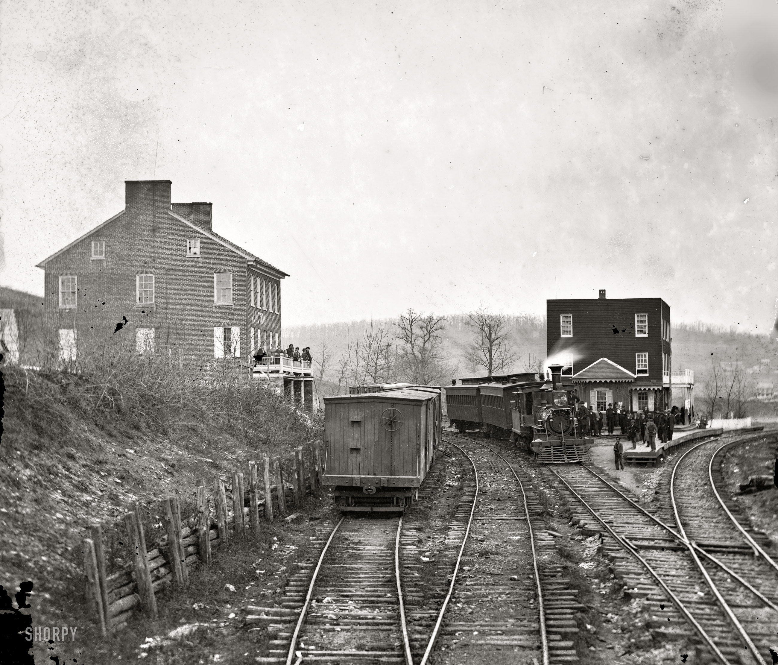 1863. "Hanover Junction, Pennsylvania. Passenger train at depot." From photographs of the main Eastern theater of war, Gettysburg, June-July 1863. Wet plate glass negative by Mathew Brady or his assistant. View full size.