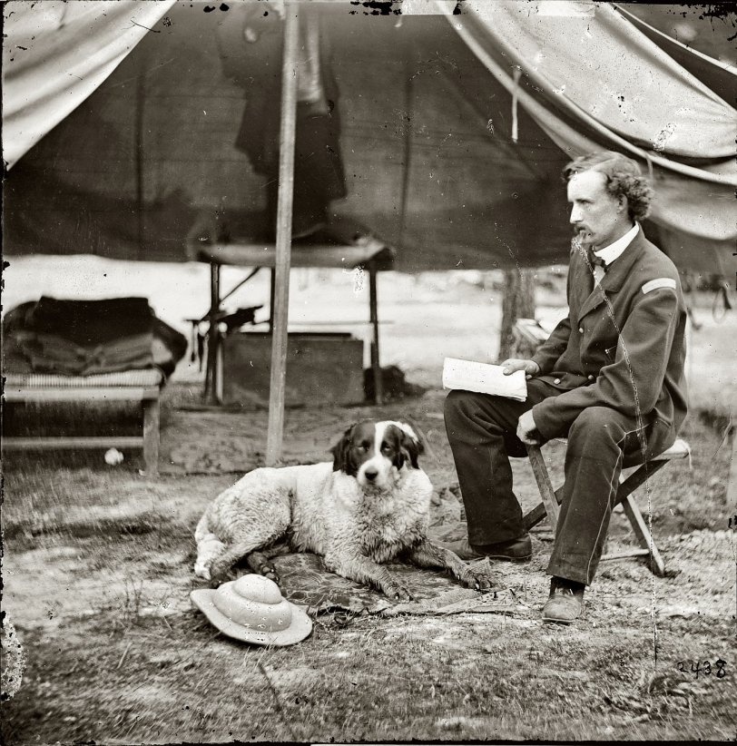 1862. The Peninsula, Virginia. "Lt. George A. Custer with dog." Photographs from the main Eastern theater of war, the Peninsular Campaign, May-August 1862. Wet plate glass negative, photographer unknown. View full size.
