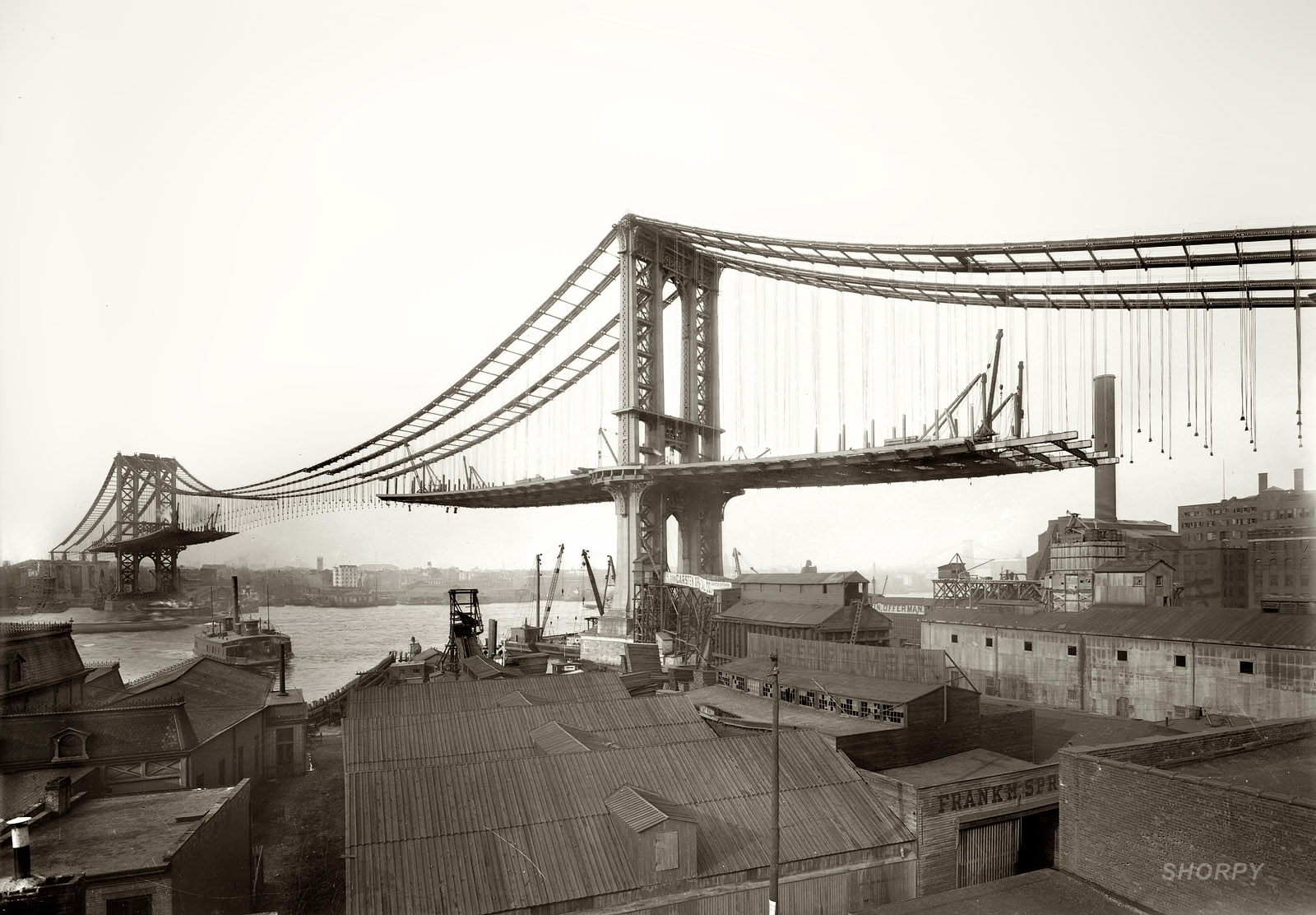March 23, 1909. Construction of the Manhattan Bridge as seen from Brooklyn. 8x10 glass negative, George Grantham Bain Collection. View full size.