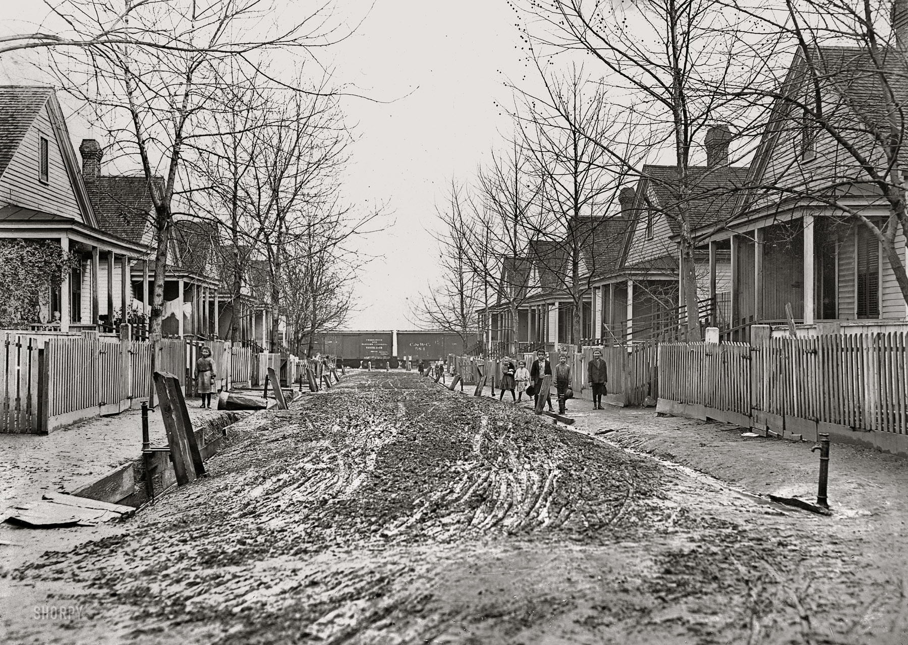 January 1909. "Augusta, Georgia. A typical street scene in Gregtown where the employees in King Mill live. The Secretary of Associated Charities said this is the most degraded part of Augusta." Photo by Lewis Wickes Hine. View full size.