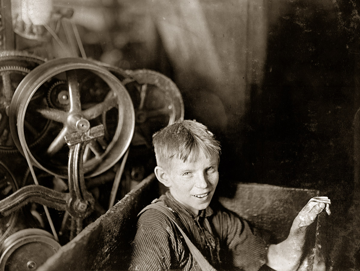 April 1909. Anthony, Rhode Island. "One of the young spinners in the Quidwick Co. Mill. A Polish boy, Willie, who was taking his noon rest in a doffer-box." Photograph and caption by Lewis Wickes Hine. View full size.
