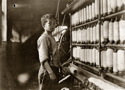 April 1909. Fiskeville, Rhode Island. "John Dempsey (looked 11 or 12). Said he helped only on Saturdays. Jackson Mill. He was working faithfully in the mule-spinning room, a dangerous place for boys." View full size. Almost 100 years after Lewis Hine took this photo, Joe Manning has tracked down John's son James, who is only 59, and conducted a fascinating (as usual) interview.