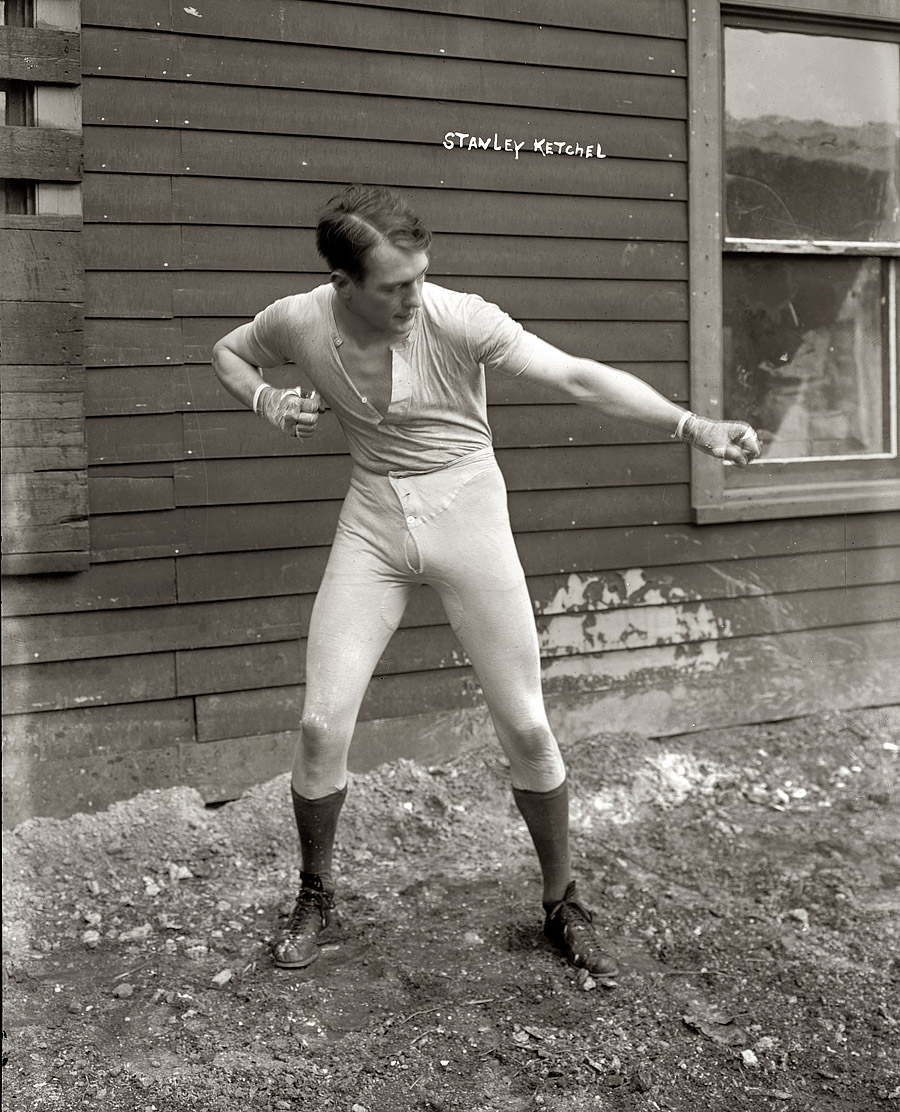 April 7, 1910. "Stanley Ketchel in boxing pose." The middleweight champion, aka the "Michigan Assassin," in an unusual choice of attire six months before he was killed by a Missouri ranch hand. G.G. Bain Collection. View full size.