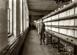 May 1909. Burlington, Vermont. "Jo Bodeon, a 'back-roper' in the mule room, Chace Cotton Mill." Photograph by Lewis Wickes Hine. View full size.