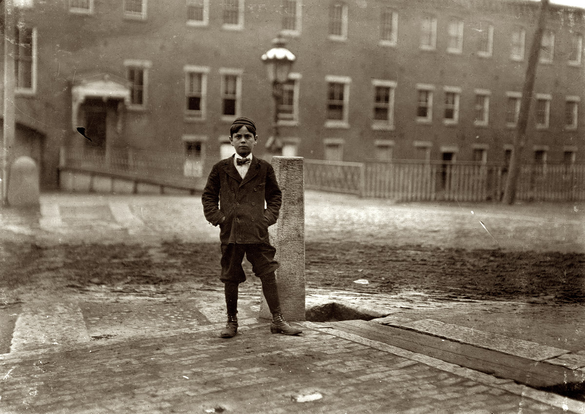 May 1909. Manchester, New Hampshire. "George Brown. Measures a little over 50 inches in height. Lives at No. 1 Corporation. Corner of Granite and Bedford Streets." View full size. Photo and caption by Lewis Wickes Hine.