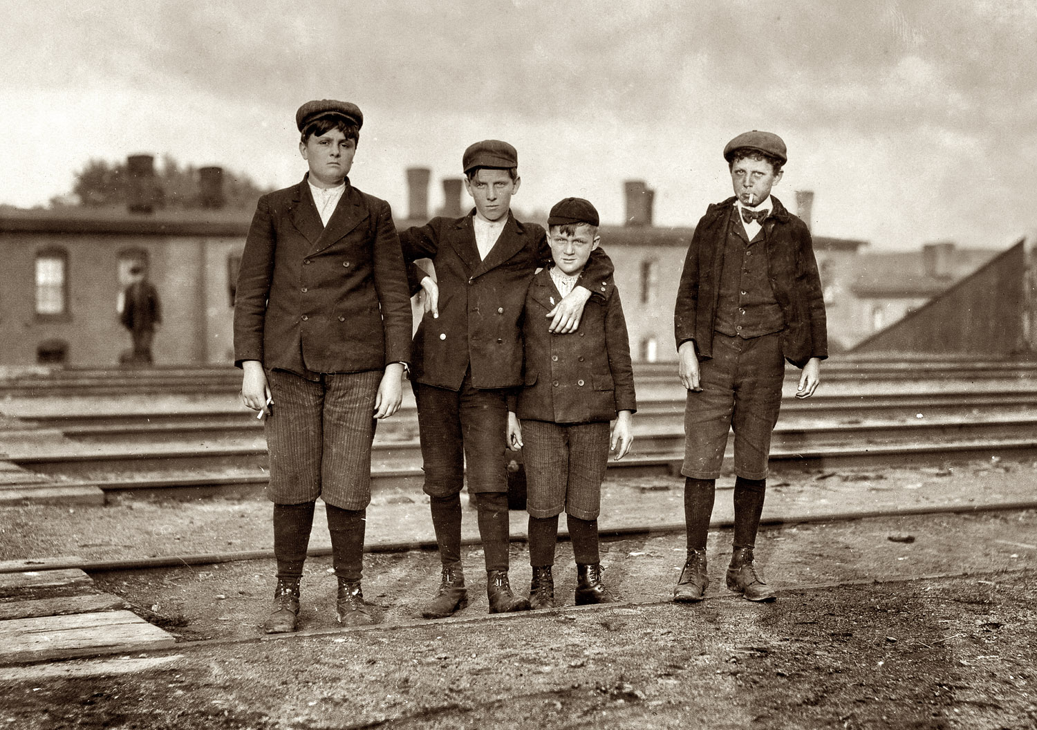 6 p.m., May 18, 1909. Somersworth, New Hampshire. "Group of boys working in Great Falls Manufacturing Co. Smallest boy is Alfred Ouellet, 212 Main Street. Fat boy is Willie Laudry, 35 South St. Boy on right hand end is Napoleon St. Lawrence, 23 Union Street." View full size. Photo and caption by Lewis Wickes Hine.