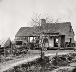Circa 1864. "City Point, Virginia (vicinity). Building used as a stable." Wet-plate glass negative, photographer unknown. View full size.