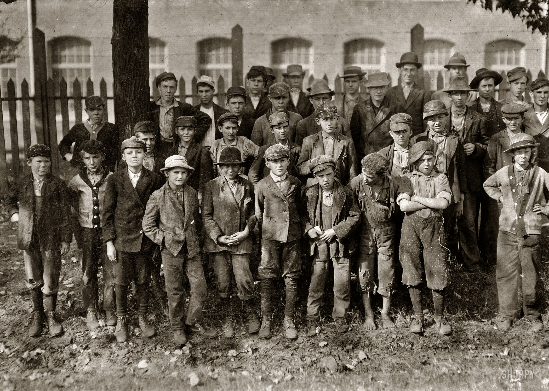 November 1910. Huntsville, Alabama. "Closing hour, Saturday noon, at Dallas Mill. Every child in photo, so far as I was able to ascertain, works in that mill. When I questioned some of the youngest boys as to their ages, they said they were 12, and then other boys said they were lying. (Which sentiment I agreed with.)" Photograph and caption by Lewis Wickes Hine. View full size.