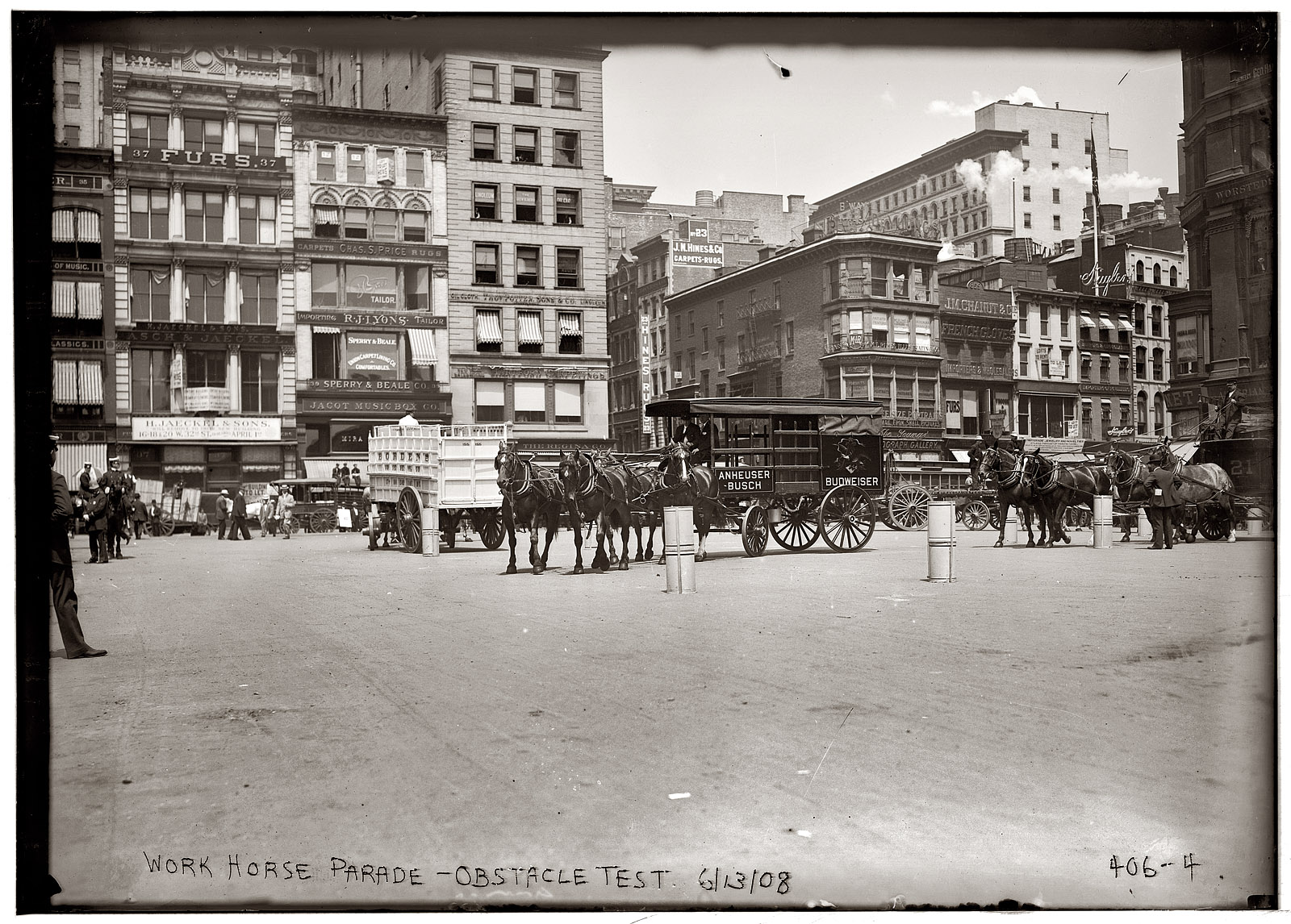 "Work Horse Parade - Obstacle Test" on Union Square in New York. Anheuser-Busch and Borden teams. June 13, 1908. View full size. 5x7 glass negative, George Grantham Bain Collection.