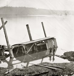 James River, Va. "Army of the James. Butler's dredge-boat, sunk by a Confederate shell on Thanksgiving Day, 1864." Wet plate glass negative. View full size.